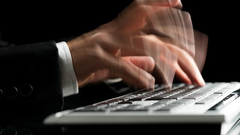 blurred-hands-typing-1